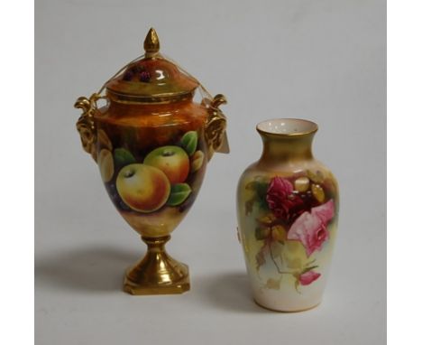 A Royal Worcester porcelain vase, decorated in the Roses palette and heightened in gilt, shape No.2226, h.14cm; together with