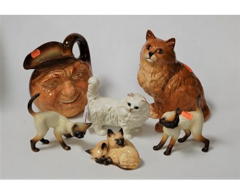 A Royal Doulton character jug of John Barleycorn Old Lad, D5787; together with a Beswick figure of a seated cat, printed mark