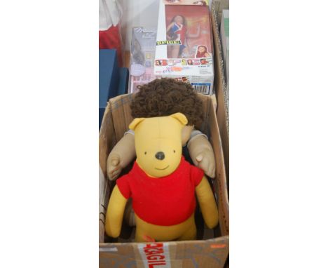 A Cabbage Patch doll and a Winnie the Pooh soft toy (2)