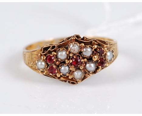 A late Victorian 15ct gold, ruby and natural seed pearl set dress ring, 1.9g, size M