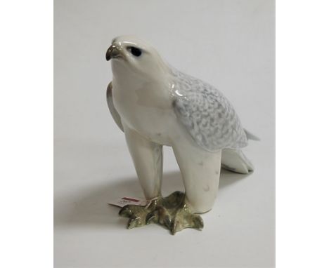 A Royal Copenhagen porcelain model of an Icelandic Falcon, in perched pose, printed backstamp, numbered 263 and monogrammed O