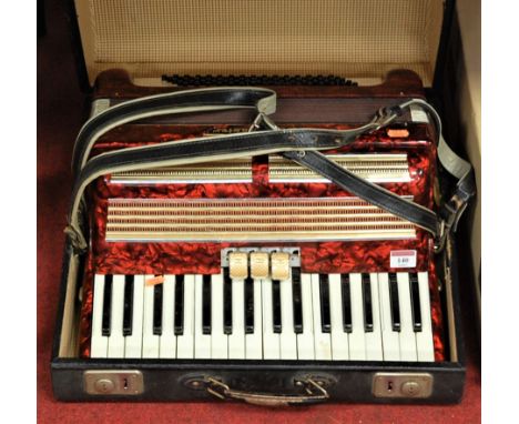 An early 20th century World Master piano accordion, cased