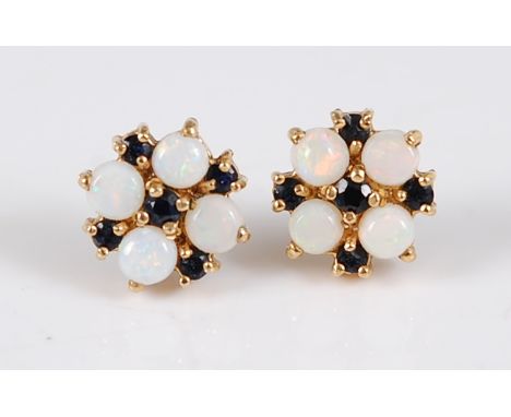 A pair of yellow metal cabochon opal and sapphire set ear studs, 10mm