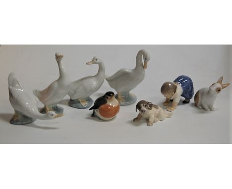 Assorted china cabinet ornaments, to include Nao, Bing &amp; Grondhal, and Royal Copenhagen (8)