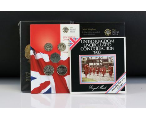 A collection of four Royal Mint coin sets to include The Royal Shield of Arms / Emblems of Britain set, The Fourth and Fifth 