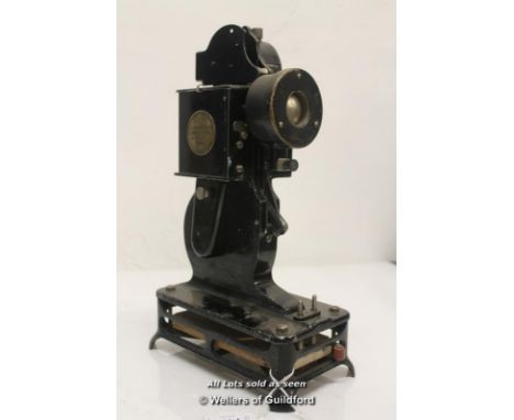 A Pathescope Baby 9.5mm cine film projector, 32cm.