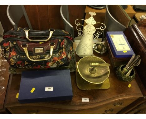 An Israeli brass nut cracker; together with a bag of CD's; a brass embossed plaque etc.
