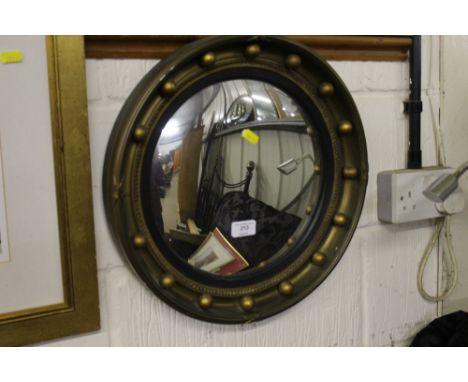 A Regency style convex wall mirror
