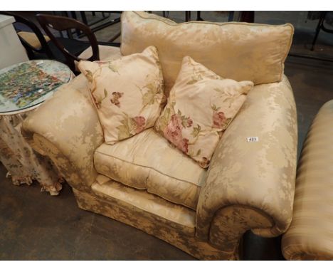 Peter Guild cream upholstered armchair with side table