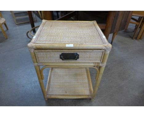 A bamboo and rattan single drawer lamp table 