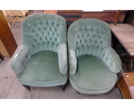A pair of similar Victorian upholstered green fabric button back armchairs 