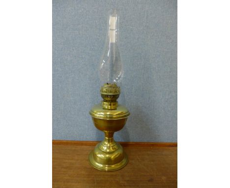 A brass oil lamp 