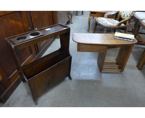 A mahogany and Bakelite magazine rack and an oak telephone stand with vintage list finder