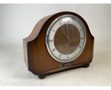An eight day mantle balloon domed clock by Alexander Clark Co and a Smith movement (engraved K6A 585). With key