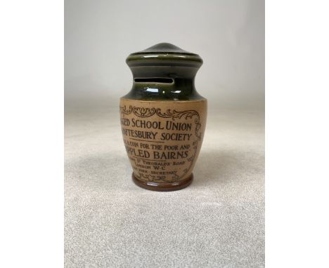 A 19th century Royal Doulton salt glaze stoneware money box for The Ragged School Union. Share a coin for the poor and crippl