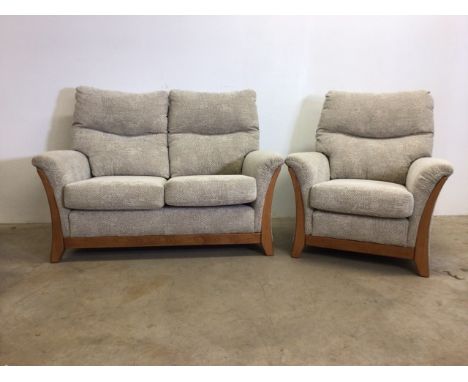 A modern two seater sofa and arm chair.W:145cm x D:85cm x H:104cm