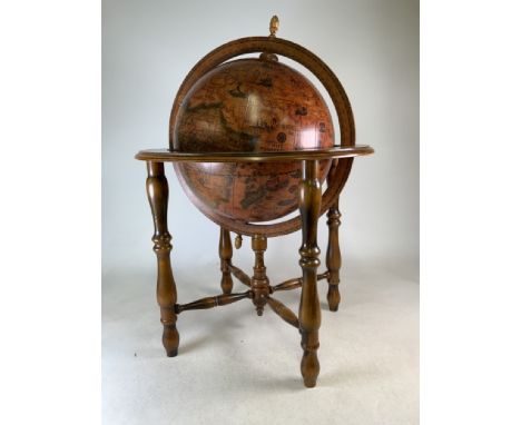 A Spanish globe on four wooden legged frame. H:100cm approx. 