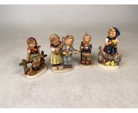 Four Hummel figurines. Little Red Rising Hood stamped 1936. Tallest:12cm