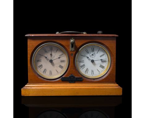 A Jaques & Son satinwood. Congress Chess Timer with twin dials having seconds dials, a going/stop lever, and brass carrying h