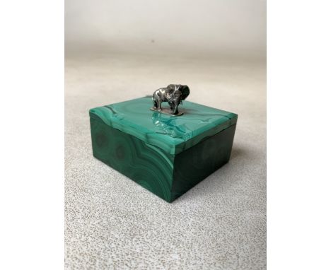 A solid malachite trinket box topped by a silver elephant finial(marked silver)W:5.5cm x D:6cm x H:5cm