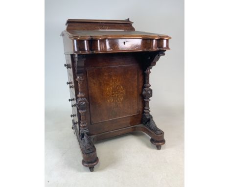 A Victorain inlaid walnut davenport with leather lift up writing slope to secretaire desk, separate compartment for ink wells