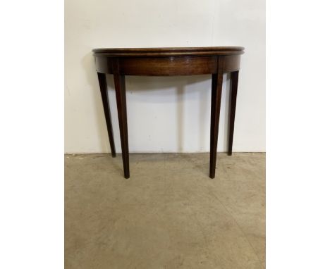 A 19th century mahogany folding tea table with double gate leg. Unfolds into a circular tea table.W:94cm x D:47cm x H:73cmExt