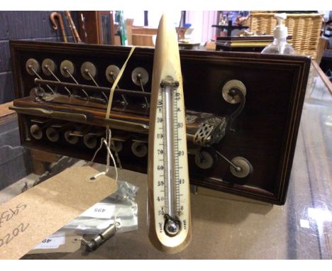 An early 20th century hippos tooth mercury thermometer. 16cm(h)