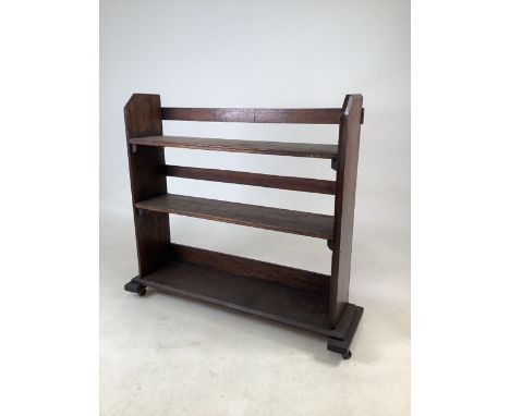 Wooden book trough on castors.W:72cm x D:20cm x H:64.5cm