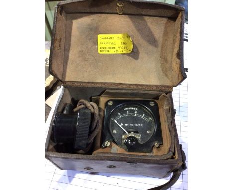 A British, World War II, radio calibration device in leather carry case with broad arrow stamp 50/2477. W:13cm x D:9cm x H:8c