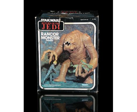KENNER - A poseable Rancor figure. Opened. Complete, working order with loose limbs. Good - Slight edge wear, tear and cellot