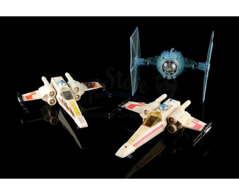 KENNER - An unboxed TIE fighter and two X-Wing fighters. Battle damage stickers applied to one X-Wing. Fair - Slight yellowin