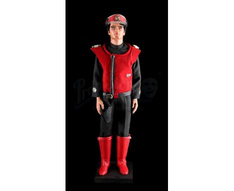 UNKNOWN - 1:1 scale replica Captain Scarlet puppet dressed in a black uniform, red tunic, peaked cap, belt with holster and r