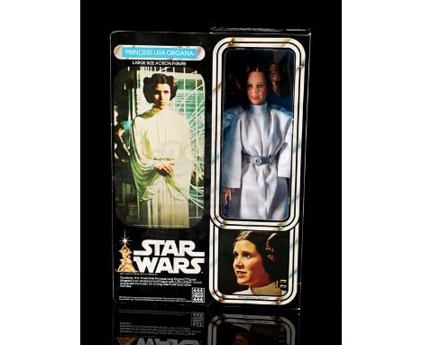 DENYS FISHER - Opened. 12" Princess Leia Organa boxed action figure. Complete with brush, comb and booklet. Stains present on