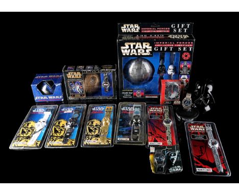 VARIOUS - Twelve Star Wars themed watches and clocks. Majority inoriginal packaging. Fair - Edgwear and creasing to all. Rips