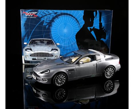 KYOSHO - Opened. 1:12 scale model die-cast vehicle which features several moveable parts and built-in gadgets. In original bo