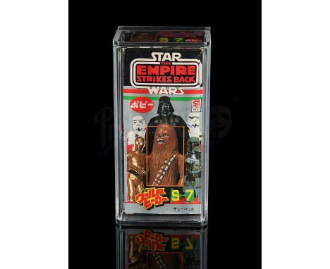 POPY - Japanese release. Opened. Includes Chewbacca figure in opened plastic baggie. Good. Dimensions: 14 cm x 10 cm x 4 cm (