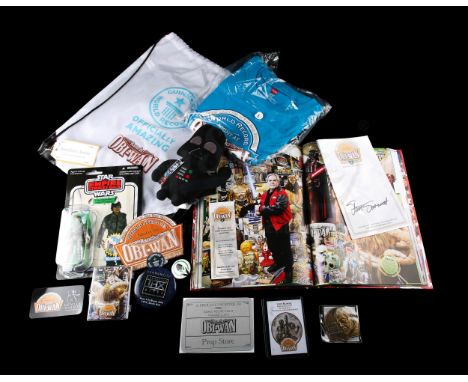 - Includes Guinness World Records 2014 book, Luke Skywalker unpunched cardback figure, Darth Vader plush toy, T-shirt (size L