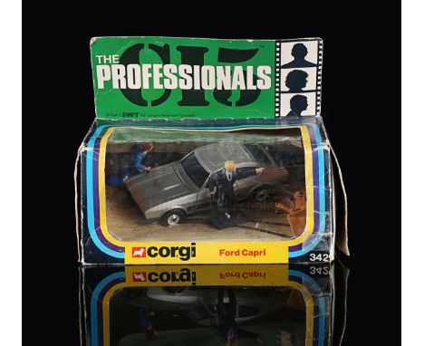 CORGI - Opened. Box contains 1:36 scale Ford Capri and three figures of Cowley, Bodie and Doyle. One of the figures has come 