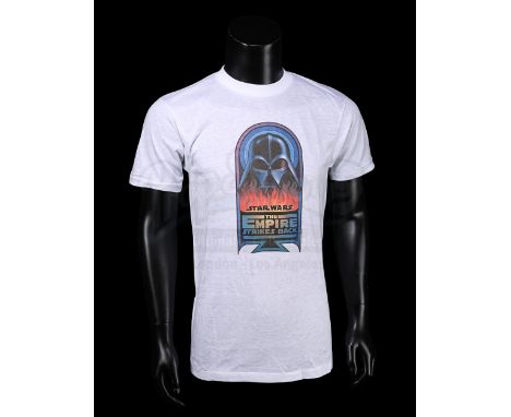 LUCASFILM - The white poly-cotton t-shirt is marked as a size large and features the Darth Vader in flames artwork printed in