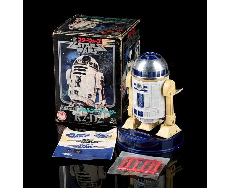 TAKARA - Unique to the Japanese market, this missile-firing R2-D2 was among the earliest Star Wars toys available. Contents c