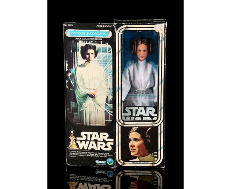 KENNER - Opened. 12" Princess Leia Organa boxed action figure. Complete with brush, comb, booklet and instructions. Partially