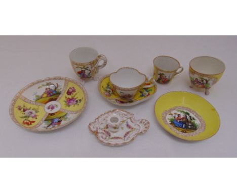 A quantity of Meissen and Dresden porcelain to include cups, saucers, plates and a taper stick holder, A/F (8)