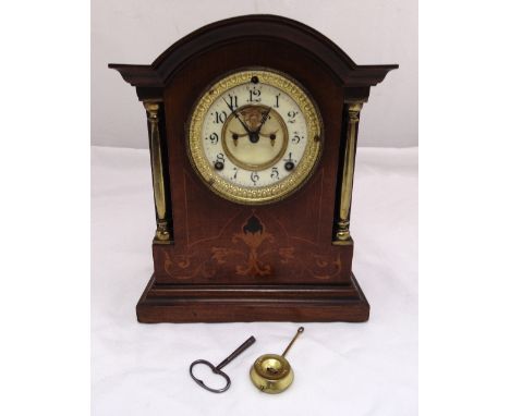 An Edwardian mahogany and satinwood inlaid bracket clock, enamel dial, Arabic numerals, two train movement to include key and