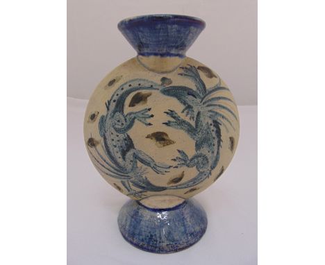 A ceramic flask decorated with dragons, on raised circular base, monogrammed NC to the side, 24cm (h)