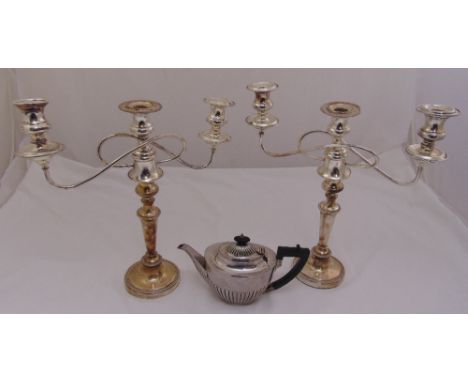 A pair of silver plated candelabra and a Mappin and Webb silver plated teapot