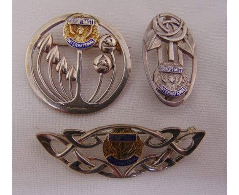Three Soroptomist International silver and enamel Art Nouveau style brooches