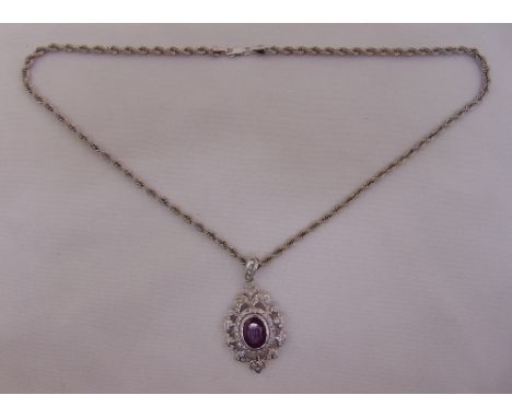 9ct white gold ruby and white sapphire pendant on a 9ct white gold chain, approx total weight 15.8g