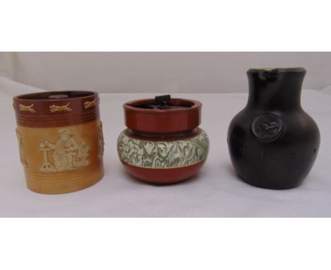 Doulton tobacco jar and cover, a ceramic tobacco jar and a Courage jug (3)