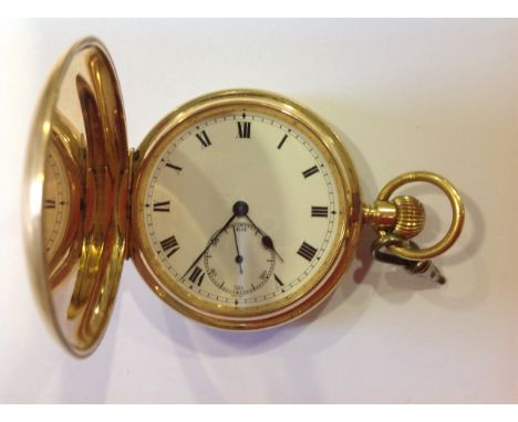 An 18 carat yellow gold full hunter pocket watch, the white enamel dial having a roman numeral chapter ring and subsidiary se