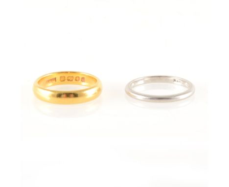 Two wedding rings, a 22 carat yellow gold wedding band, 3.9mm wide plain polished D shape, hallmarked London, approximate wei